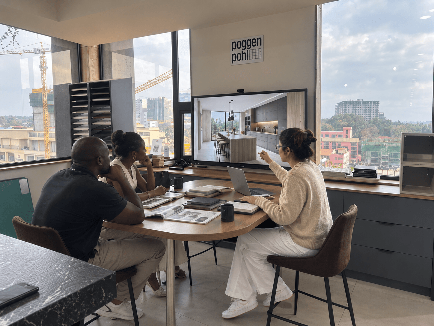 A client consultation at Bath & Kitchen Studio, reviewing a kitchen design together
